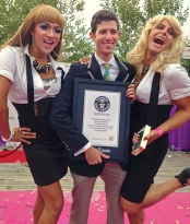 Alex Angert poses for pictures at the world’s largest gathering of people dressed as drag queen Madonnas.